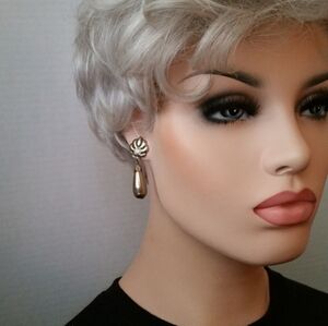 Earrings - silver toned shiny metal - leaf at top